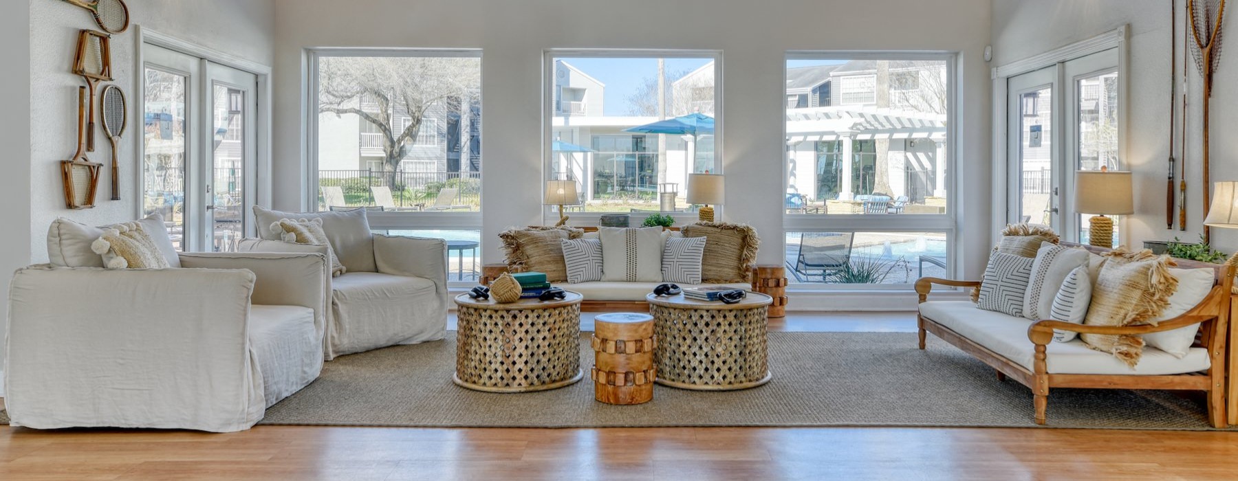 a lounge area with couches and chairs